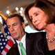 Parties of Boehner (left) and Pelosi will battle in November. (B. Smialowski/AFP/Getty)